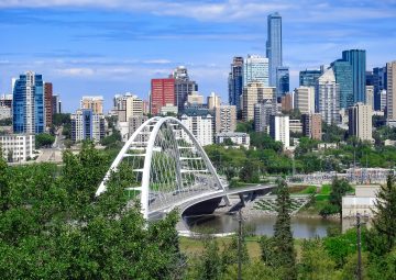 The Walterdale suspension bridge with downtown view in Edmonton,